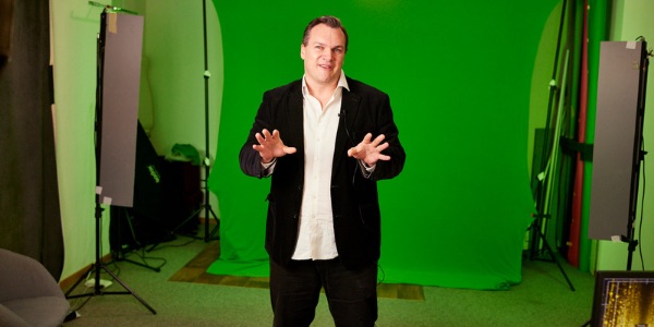 Benjamin hosting in a studio